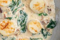 Seared Scallops in Rich Cream Sauce with Garlic and Herbs