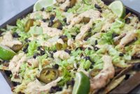 Chicken and Black Bean Nachos with Melted Cheese and Salsa