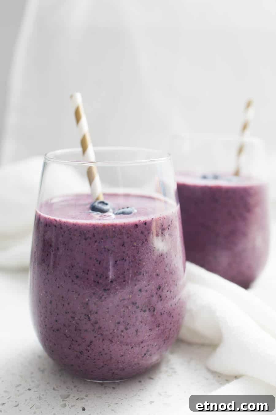 blueberry smoothies on a white background