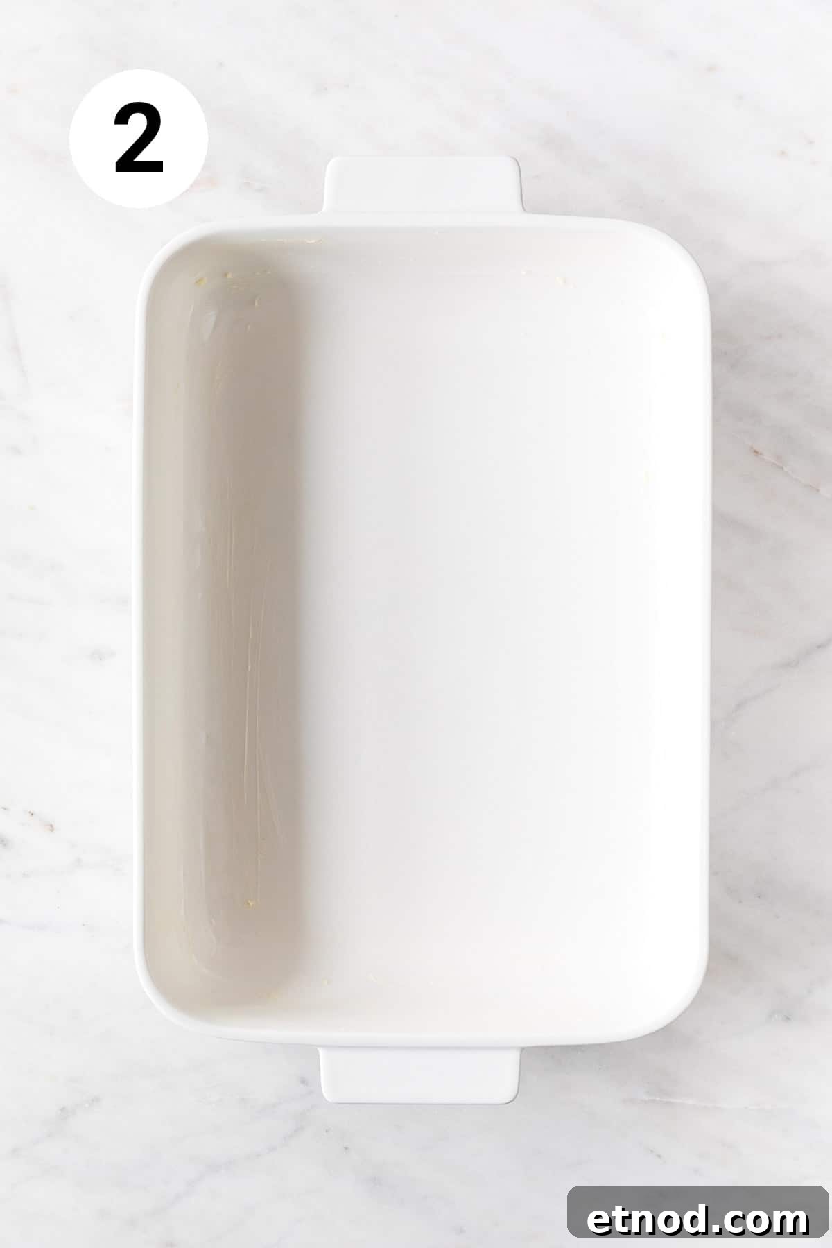 Greased baking dish.