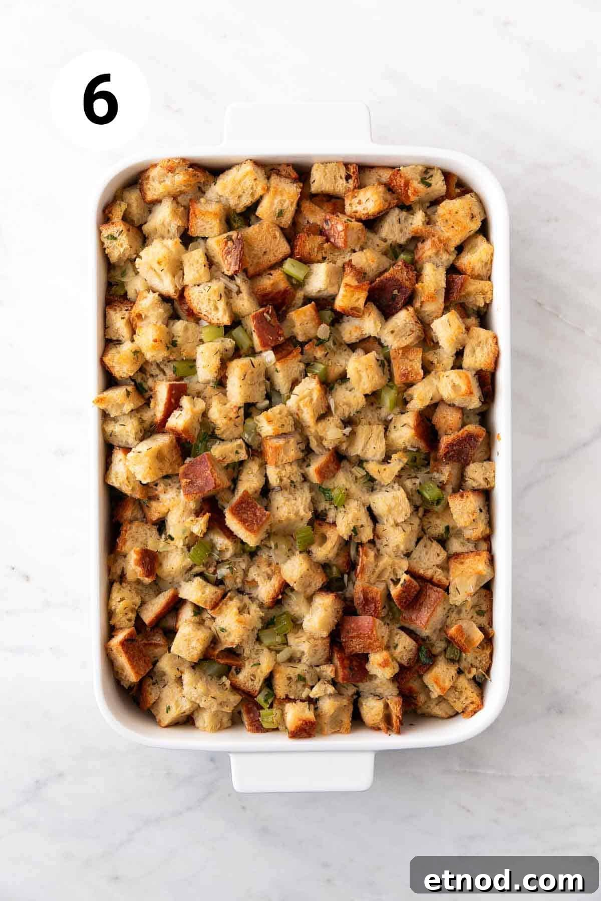 Baked vegan stuffing in a baking dish.