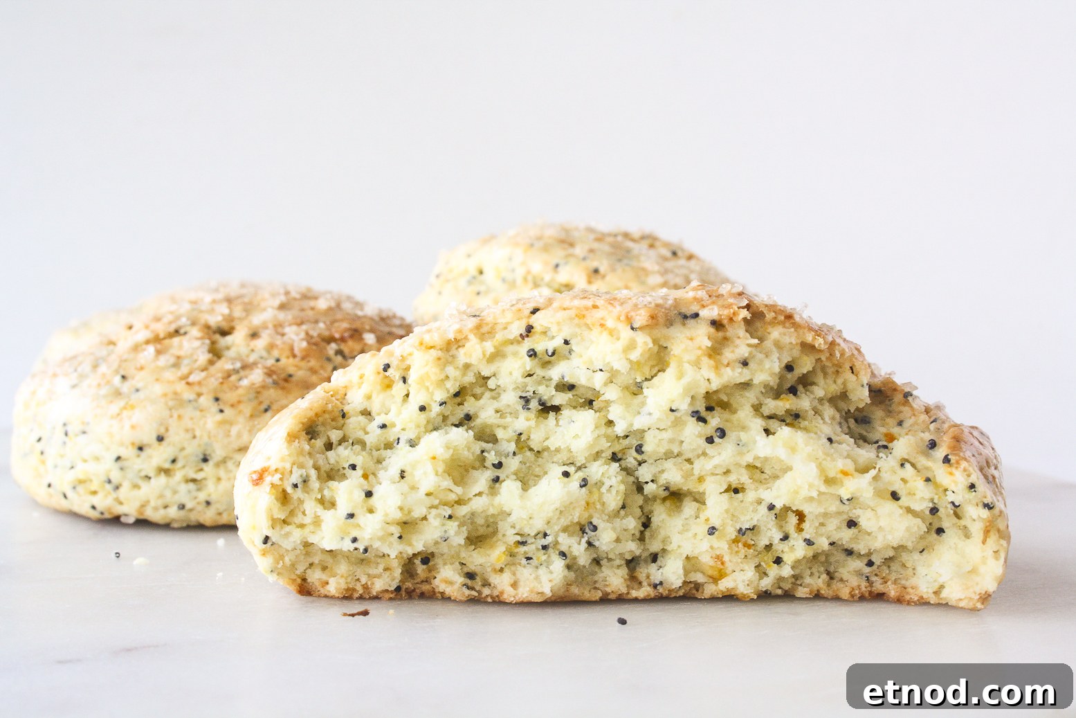 Eggless Orange and Poppy Seed Scones – Citrus Breakfast Treat 4 Tender scones bursting with fresh orange zest and poppy seeds!