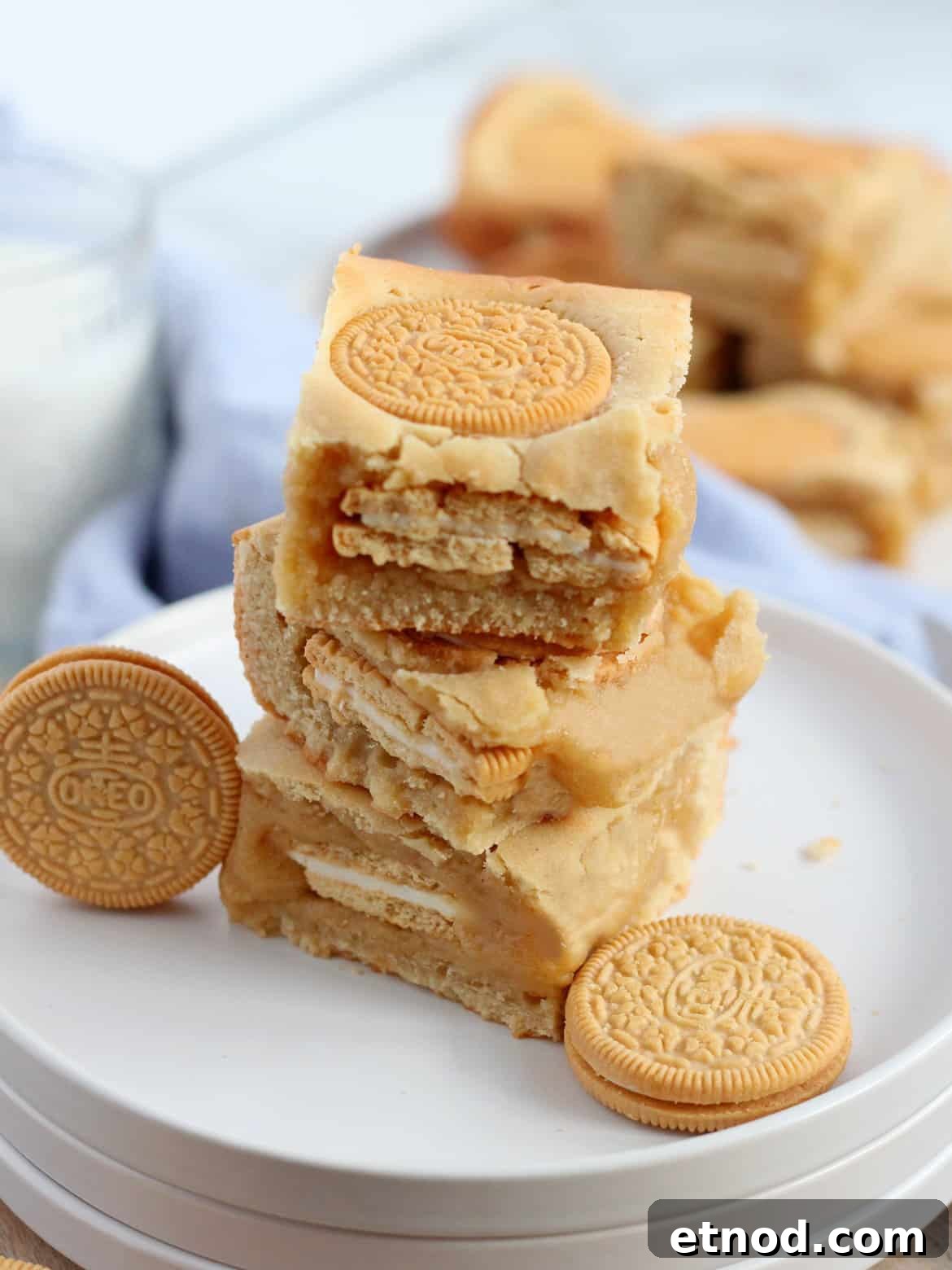Golden Oreo Blondies Recipe: Chewy Vanilla Oreo Blondies 13 Golden oreo blondie tower on white plate