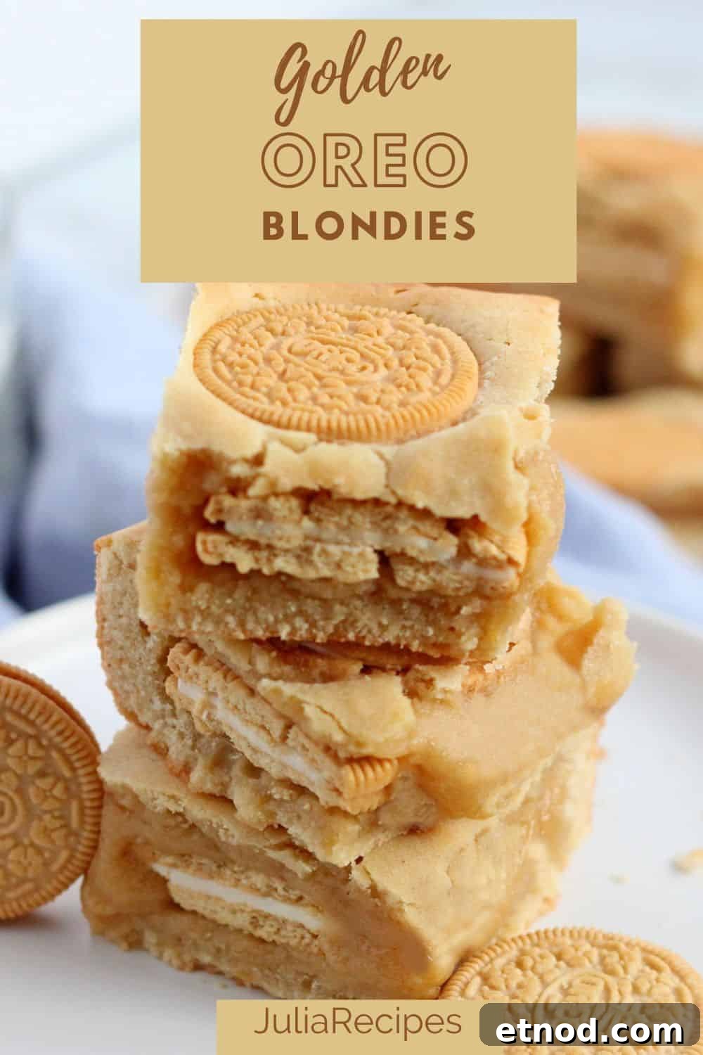 Golden Oreo Blondies Recipe: Chewy Vanilla Oreo Blondies 17 golden oreo blondies stacked on white plate with oreo cookies around
