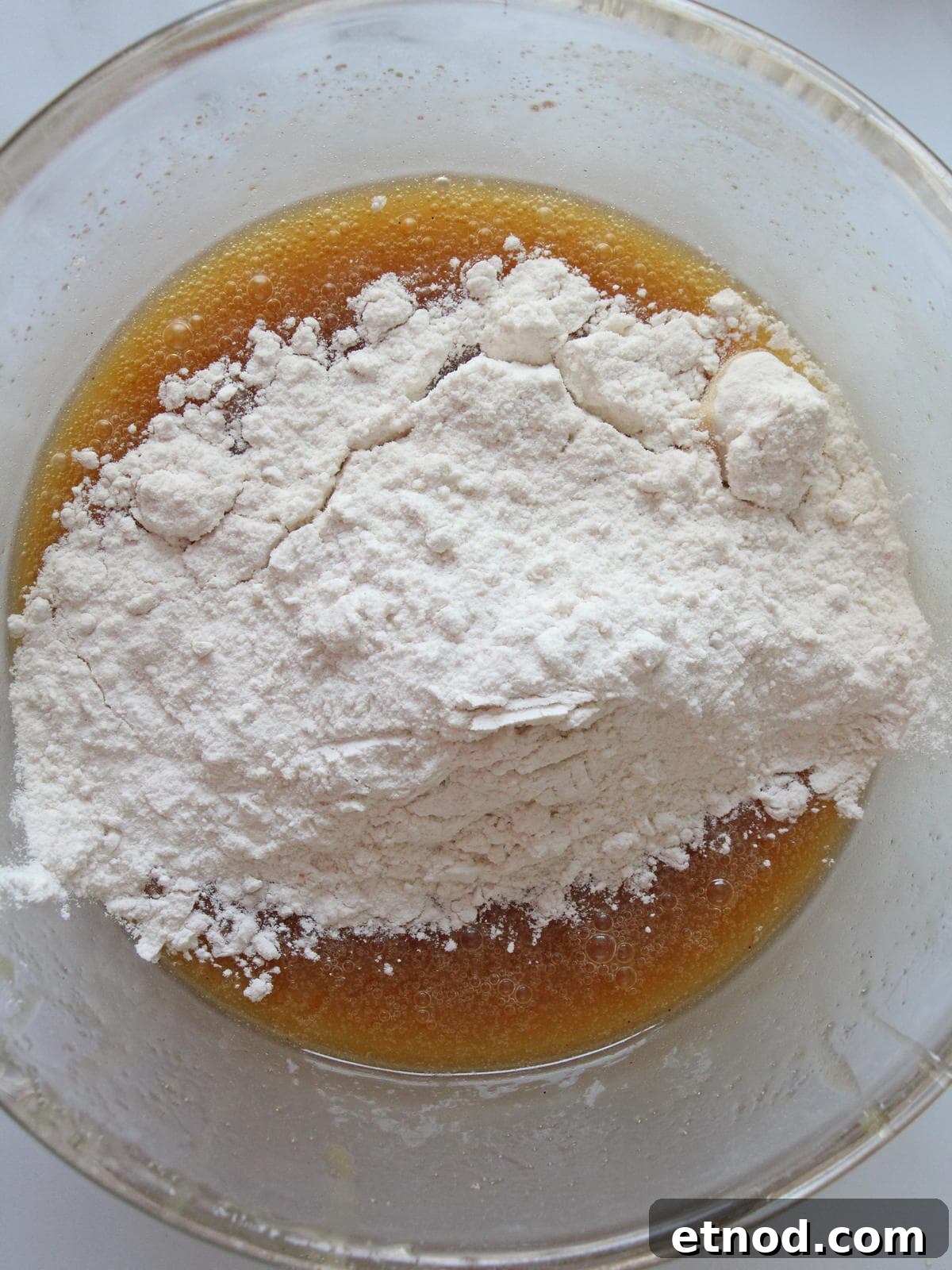 Golden Oreo Blondies Recipe: Chewy Vanilla Oreo Blondies 6 Batter for blondies in preparation inside transparent kitchen bowl