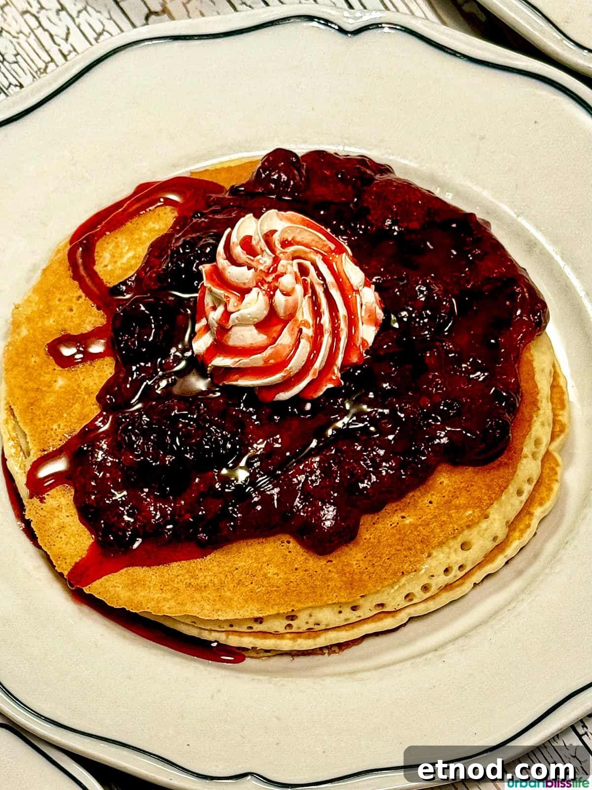 Knott's Berry Farm Boysenberry Food Trail: Must-Try Treats Guide 5 boysenberry syrup over pancakes.