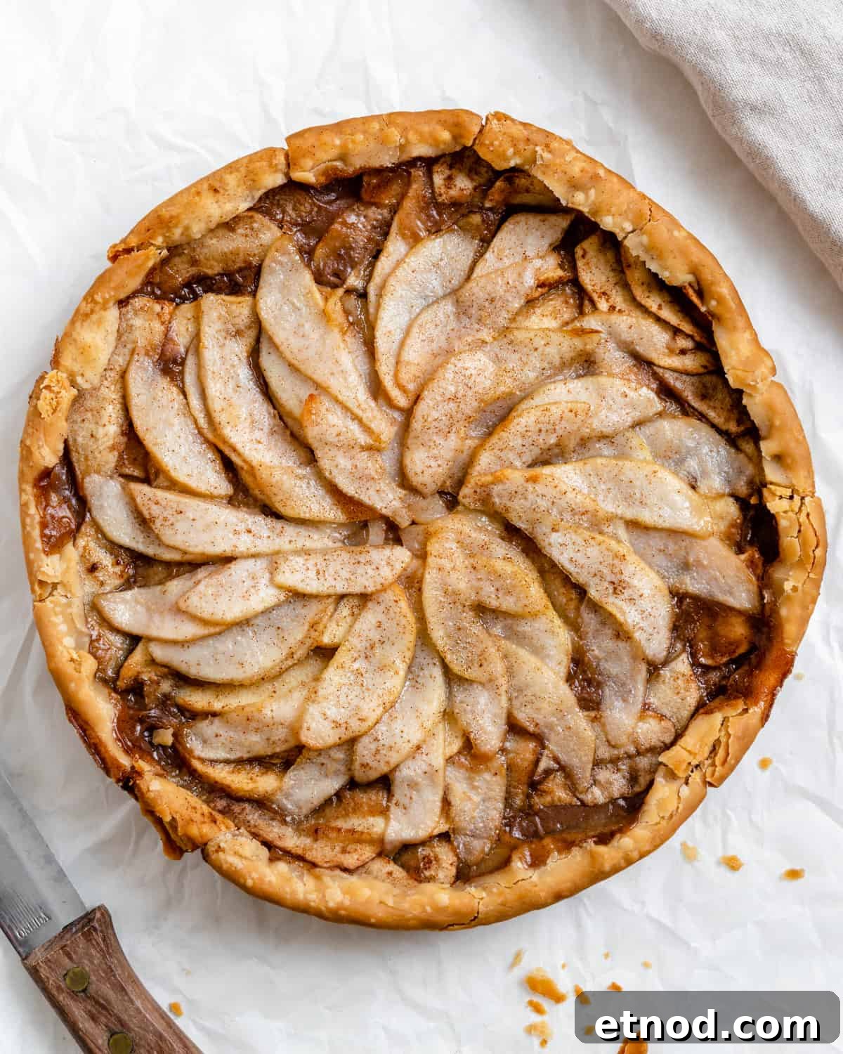 Apple and Pear Pie Recipe with Cinnamon Crumble 2 completed Easy Apple Pear Pie against a white surface