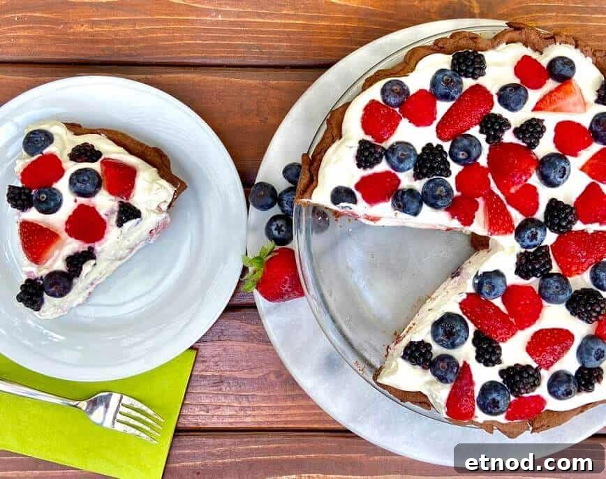 Mixed Berry Cream Chocolate Pie Recipe 4 Slice of pie taken from whole pie.