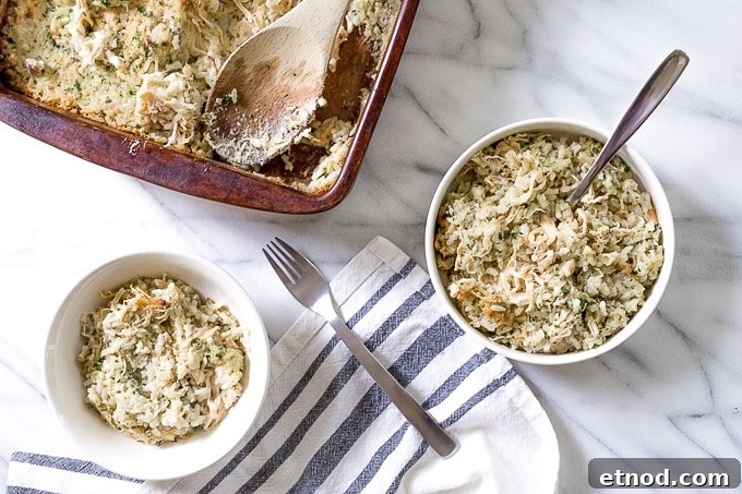 Two bowls of chicken and rice casserole on a table.