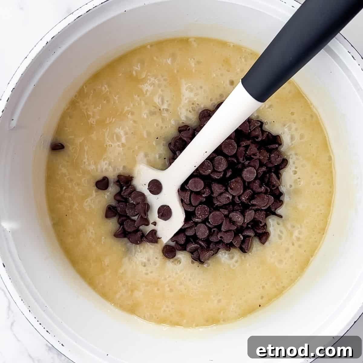 Whimsical Fantasy Fudge Recipe for Magical Flavor 5 Adding the chocolate chips.