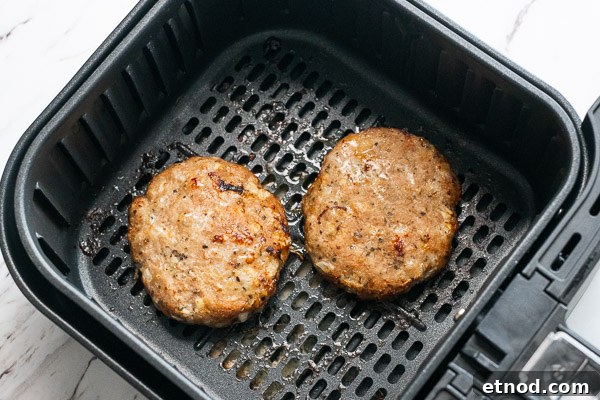 Low-Carb Lettuce-Wrapped Turkey Burgers from the Air Fryer 8 2 cooked turkey patties in air fryer basket