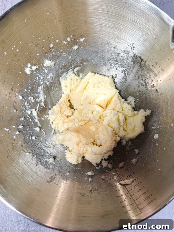 Creamed butter and sugar in a mixing bowl.
