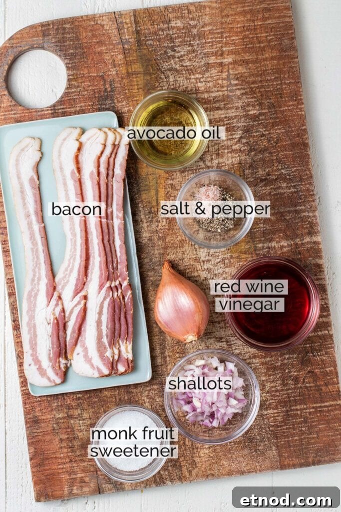 Warm Bacon Vinaigrette Recipe for Salads and Veggies 3 The ingredients needed for hot bacon dressing sitting on a cutting board with labels.
