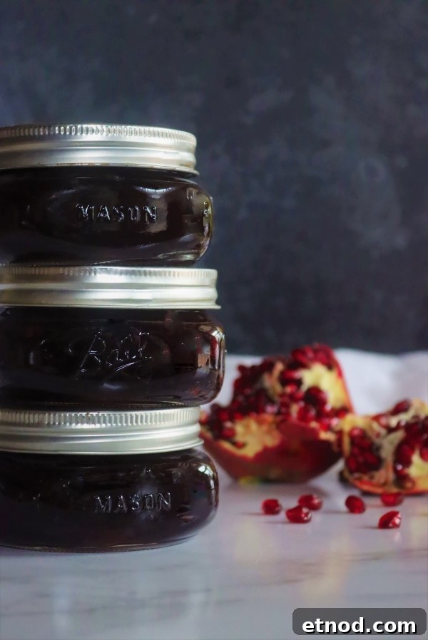 Homemade Pomegranate Jelly Recipe: Bright Flavor in Jars 7 Canning pomegranate jelly in a water bath canner