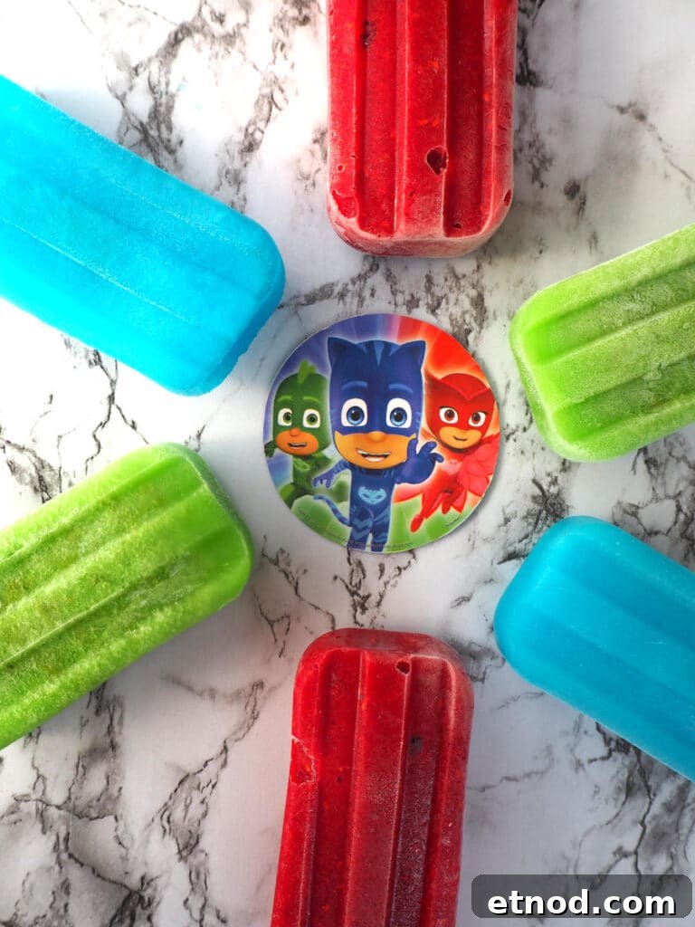 PJ Masks-Inspired Popsicle Recipes Kids Will Love 16 PJ Masks popsicles in a circle