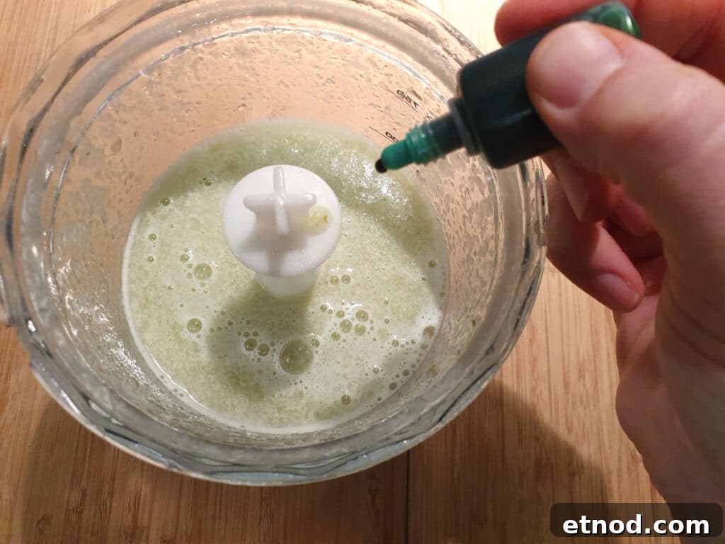 PJ Masks-Inspired Popsicle Recipes Kids Will Love 8 Adding food colour to blended grapes