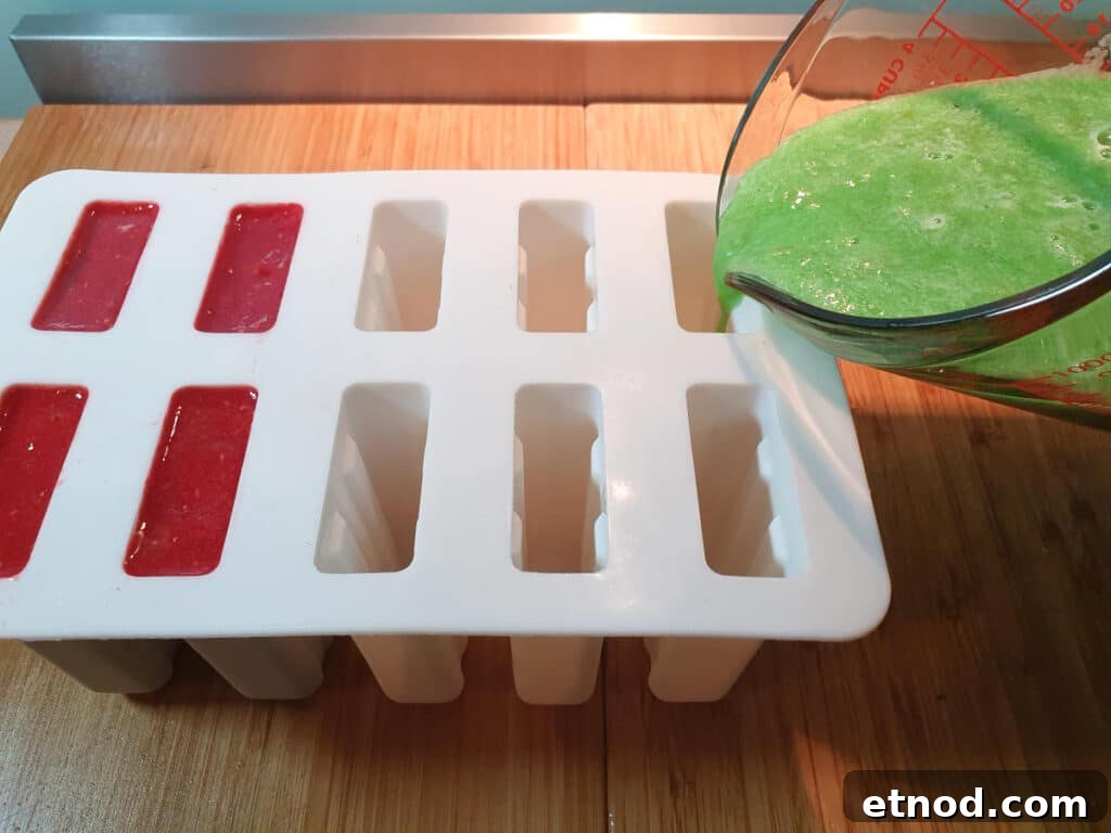 PJ Masks-Inspired Popsicle Recipes Kids Will Love 9 Adding owlet and geko mixes to popsicle moulds