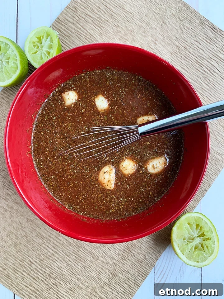Crispy Instant Pot Carnitas Recipe for Authentic Mexican Flavor 6 Mixed carnitas liquid whisked together, ready to pour on meat.