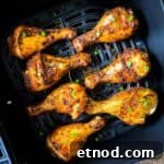 A closeup overhead picture of crispy air fryer chicken legs.
