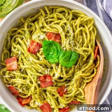 Bacon Pesto Pasta in bowl with spoon.