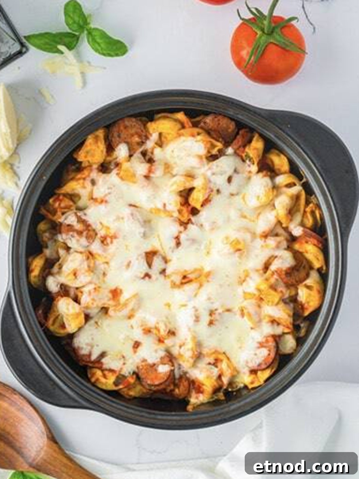 Creamy Italian Sausage Tortellini Bake: Cheesy Oven Pasta Delight 9 Finished sausage tortellini bake with melted golden mozzarella on top.
