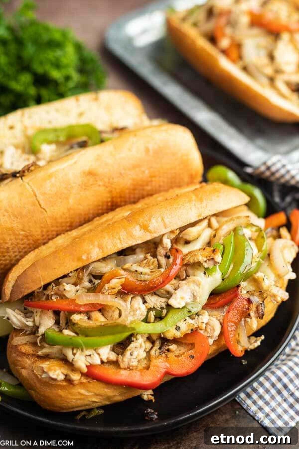 Blackstone Philly Cheesesteak Chicken Sandwich Recipe 8 Philly cheesesteak on a plate.