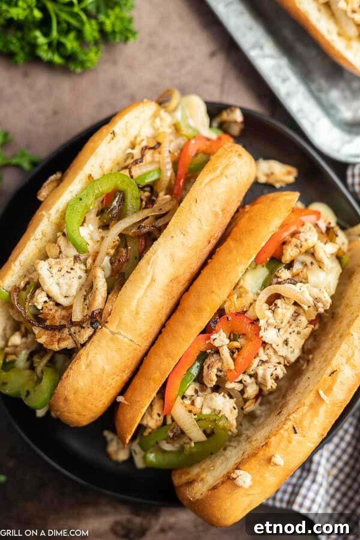 Blackstone Philly Cheesesteak Chicken Sandwich Recipe 9 Philly cheesesteak on a plate.