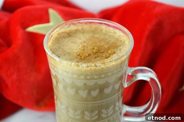 banana-milk-coffee- www-insidetherustickitchen-com Close up of banana milk coffee topped with cinnamon