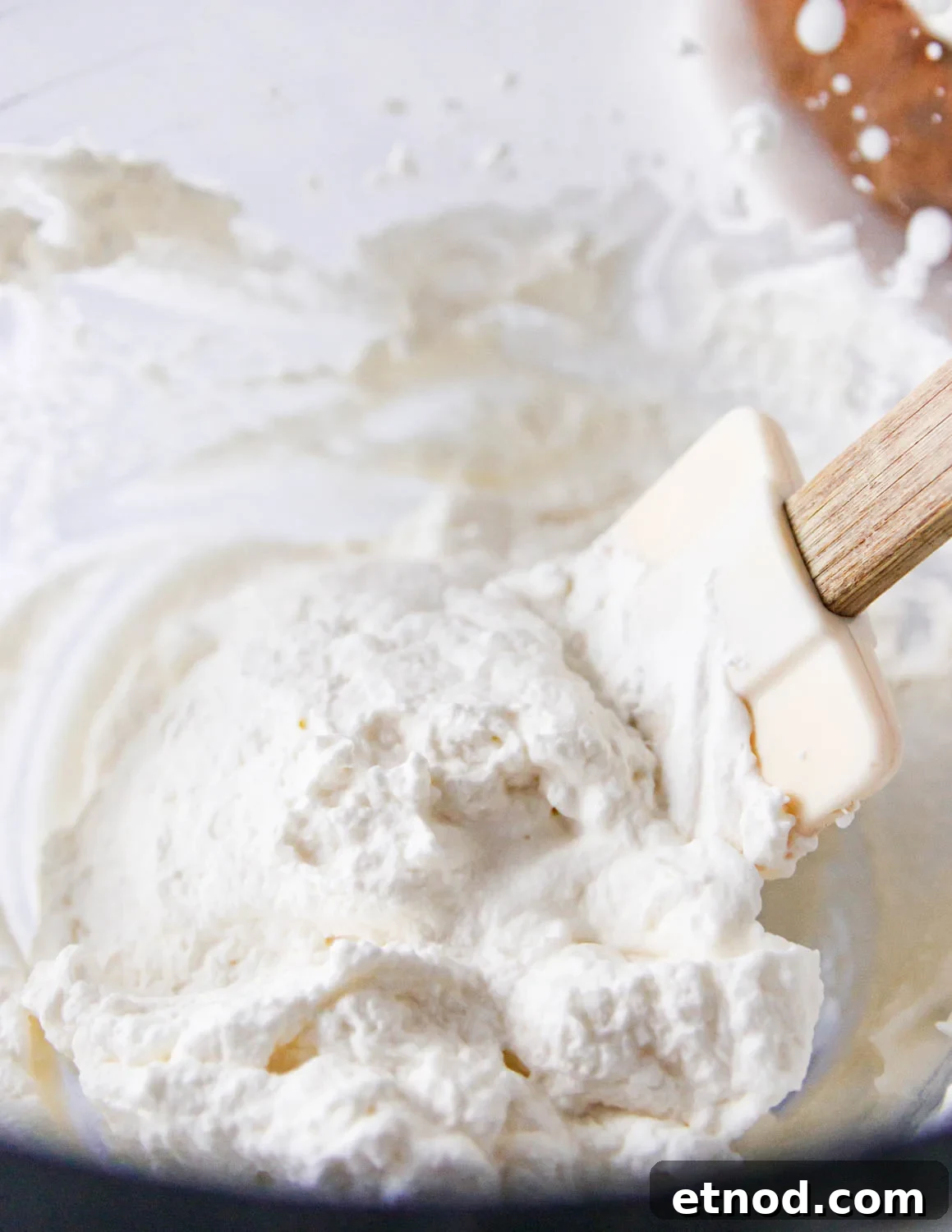 Angled photo into the bowl of prepared whipped cream. This shows you the final texture.