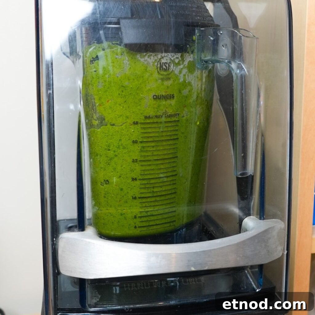 Authentic Puerto Rican Sofrito Recipe for Flavorful Dishes 5 Puerto Rican Sofrito in a blender.