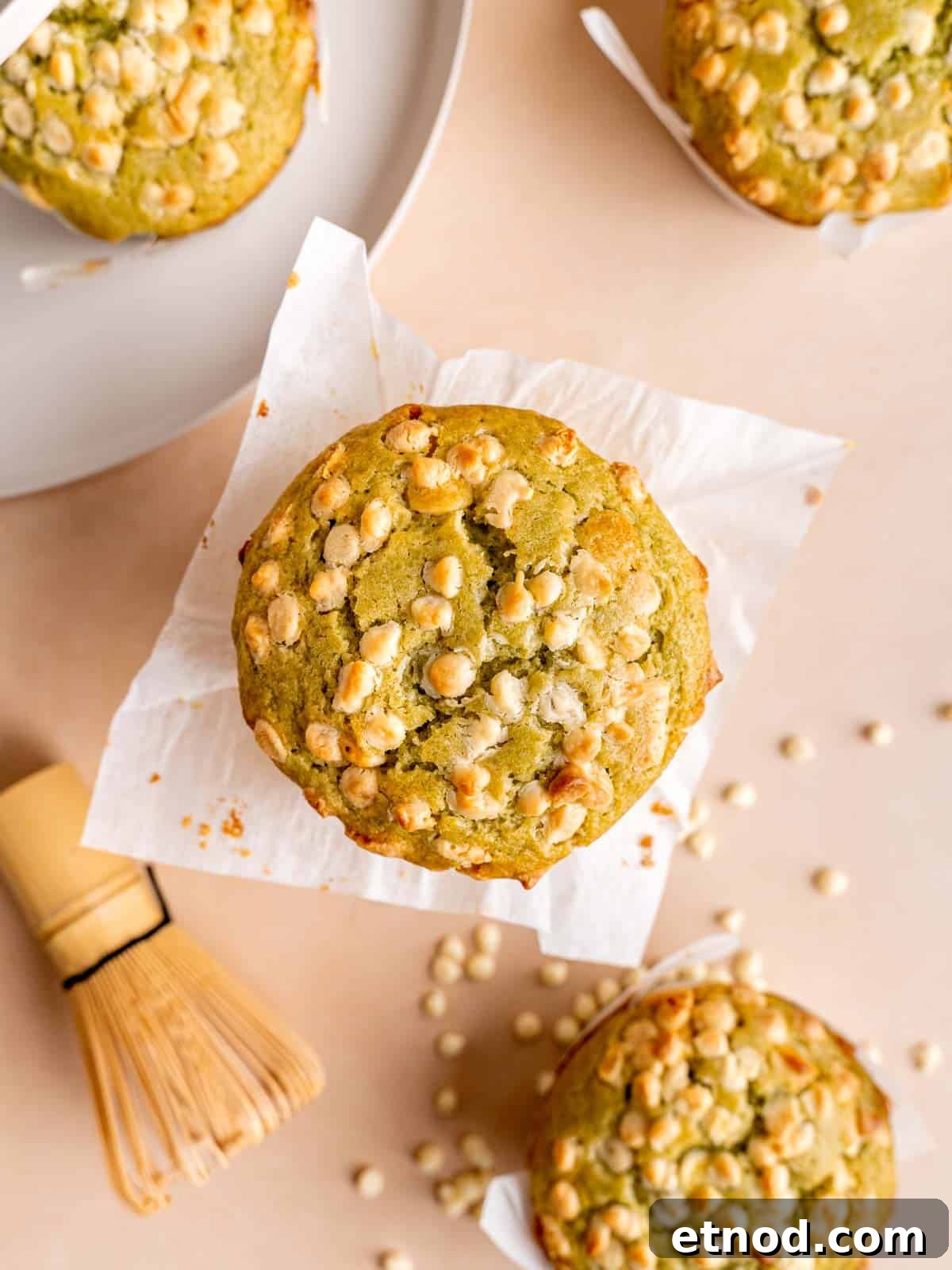 Matcha Muffins with White Chocolate Chips: Soft & Moist Recipe 2 Top view of white chocolate chip matcha muffins.