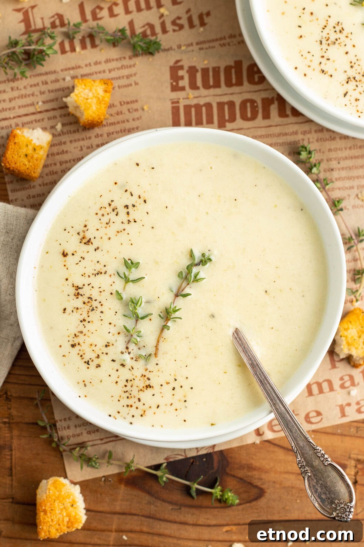 Cream of Onion Soup Recipe: Rich, Silky Classic Soup 2 Top-down view of a bowl of rich cream of onion soup.