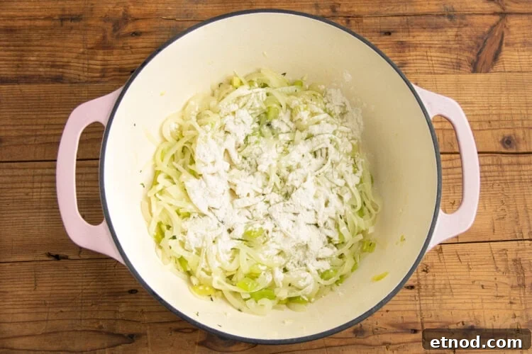 Cream of Onion Soup Recipe: Rich, Silky Classic Soup 7 Onions and celery in a large pot with minced garlic and thyme.