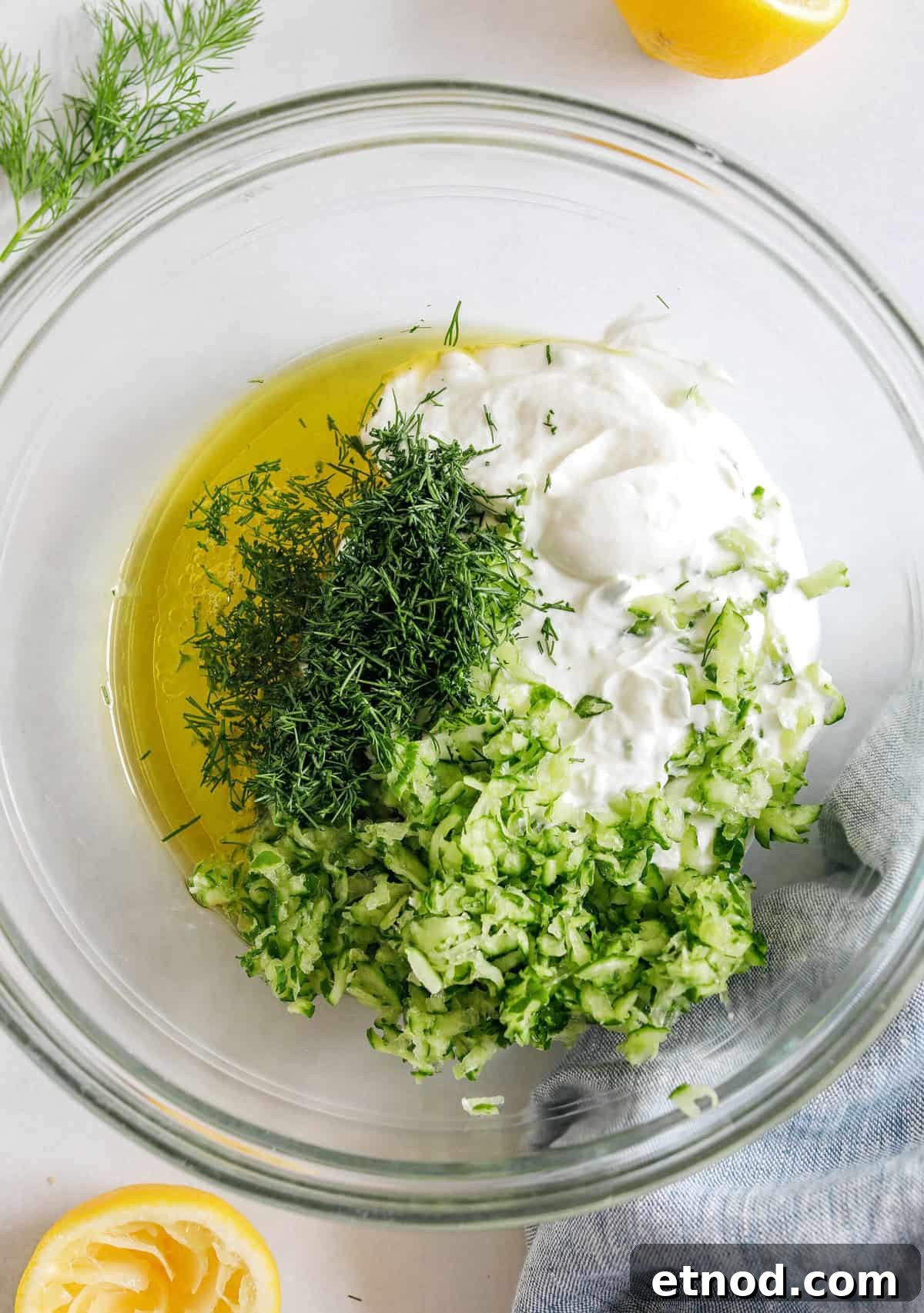 Authentic Homemade Tzatziki Recipe for Creamy Greek Sauce 3 Fresh and flavorful Homemade Tzatziki Sauce is a creamy yogurt-based sauce perfect for the summer served with kabobs, grilled veggies, pita bread and more! This recipe is easily made in just 5 minutes with a few simple ingredients!