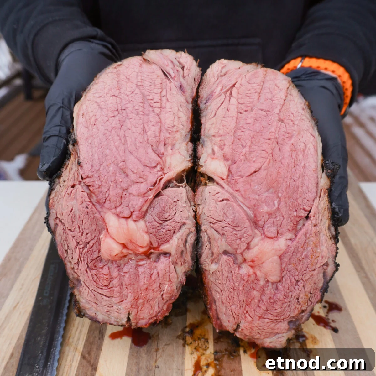 Juicy Grilled Prime Rib Sliders Recipe for Game Day 9 Grilled and seared prime rib sliced in half showing a medium rare cook inside.
