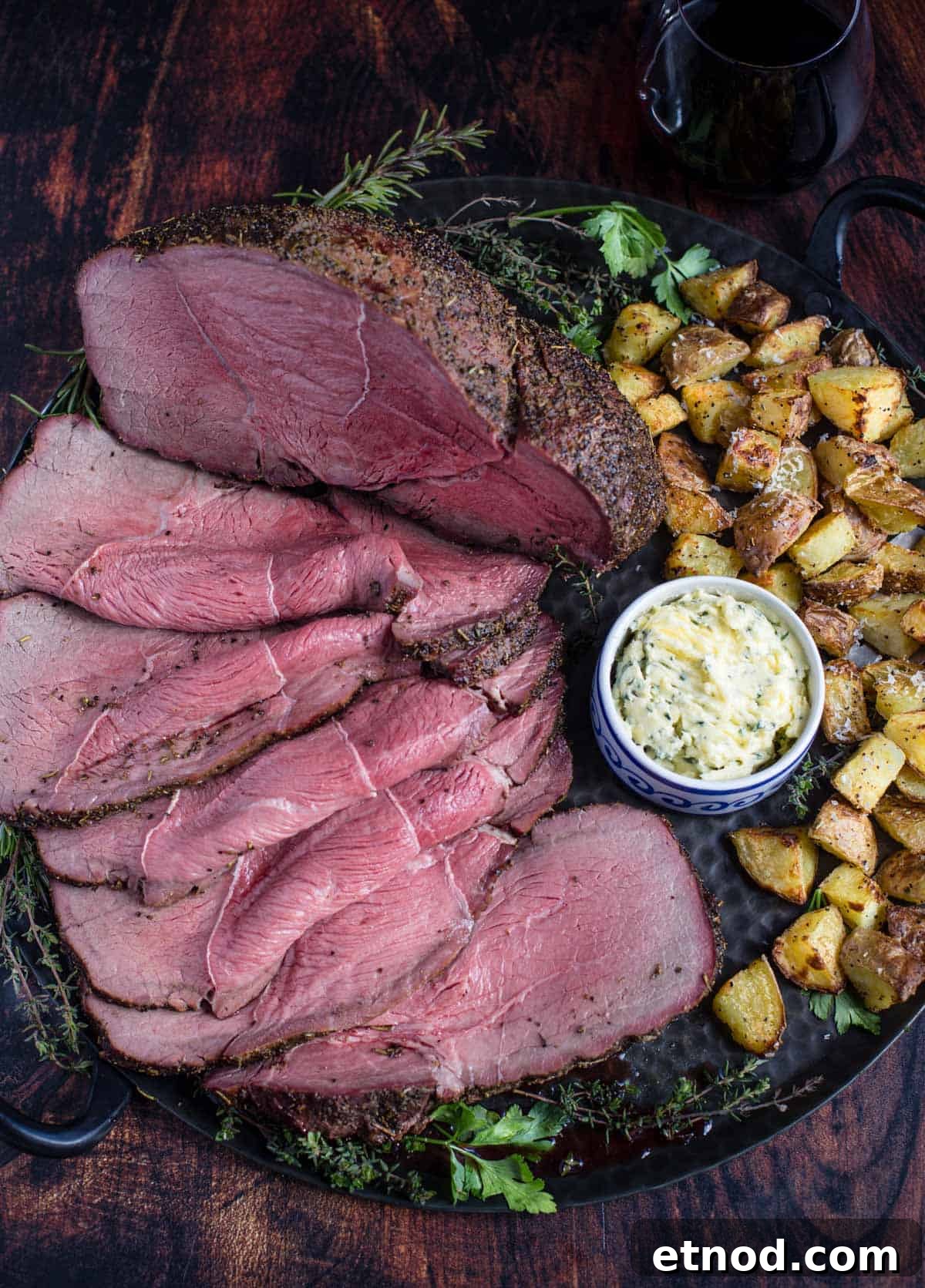 Smoked Herb-Crusted Roast Beef Recipe 7 Smoked beef with potatoes and compound butter.