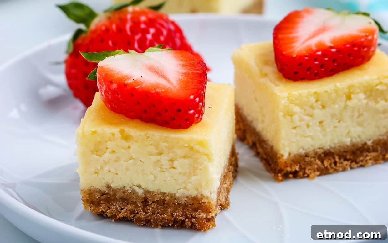 31 Forgotten Grandma Potluck Recipes Worth Bringing Back 24 Cheesecake bar squares topped with sliced strawberries.