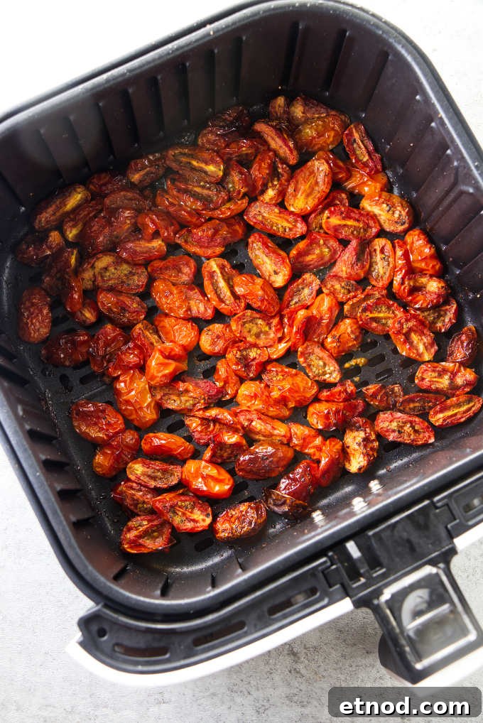 Crispy Air Fryer Cherry Tomatoes Recipe in Minutes 8 Cherry tomatoes lightly charred in an air fryer.