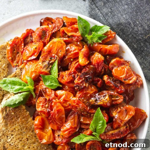 A plate of air fryer cherry tomatoes with toast.