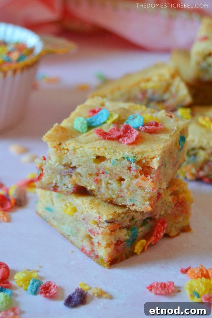 Fruity Pebbles Blondies Recipe: Chewy, Colorful Treats 5 Two high stack of fruity pebbles blondies