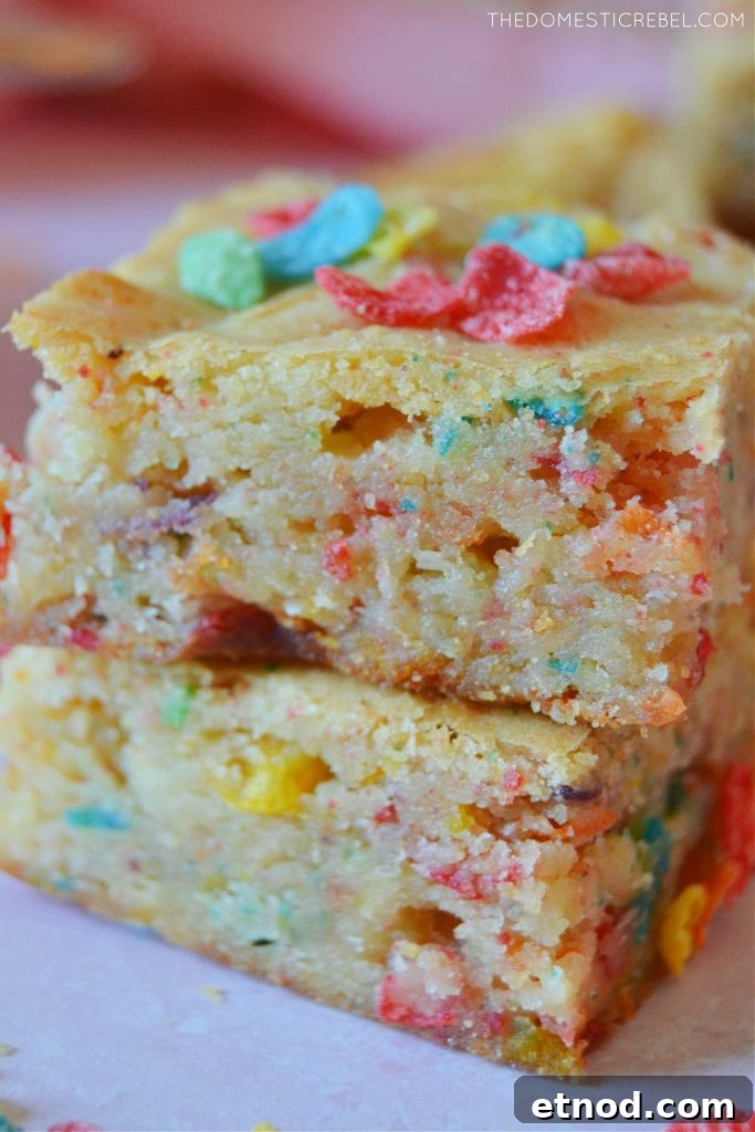 Fruity Pebbles Blondies Recipe: Chewy, Colorful Treats 6 Closeup stack of fruity pebbles blondies
