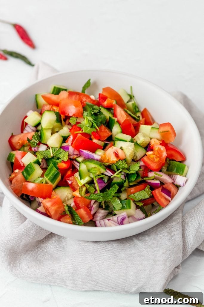 bowl of Indian tomato and cucumber salad
