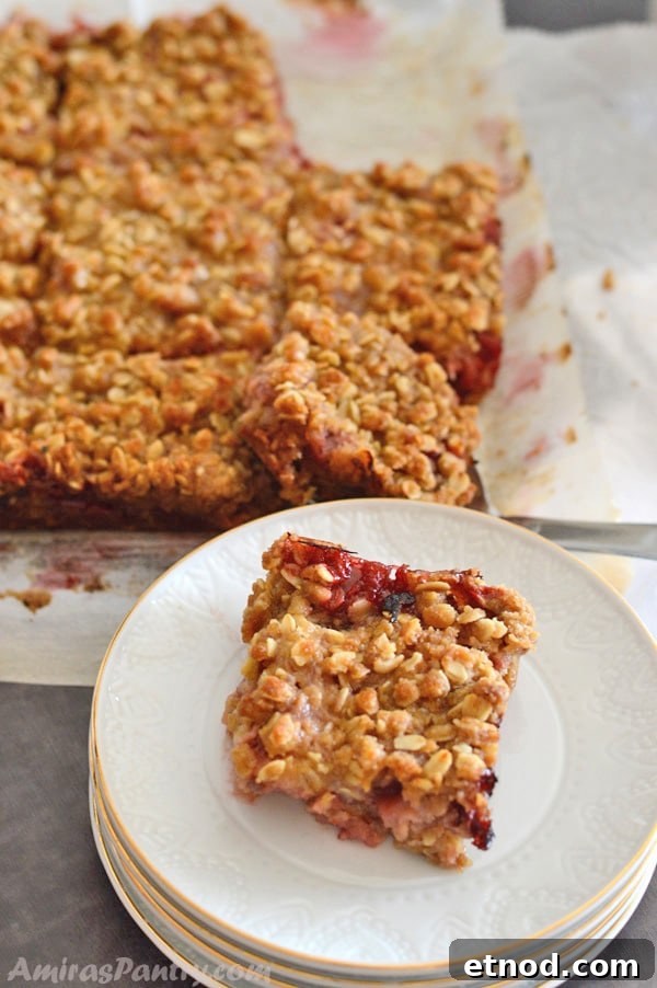 A plate with crumbled rhubarb bars