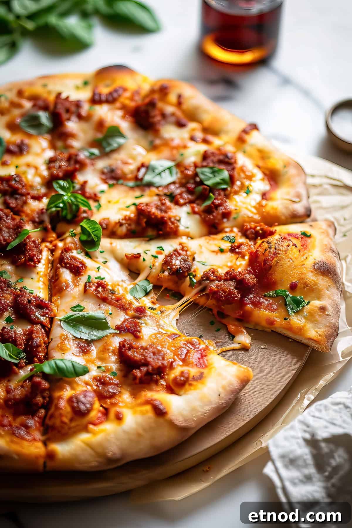 Homemade Chorizo Pizza Recipe: Crispy Thin-Crust Flavor 2 Chorizo pizza with cheese and basil.
