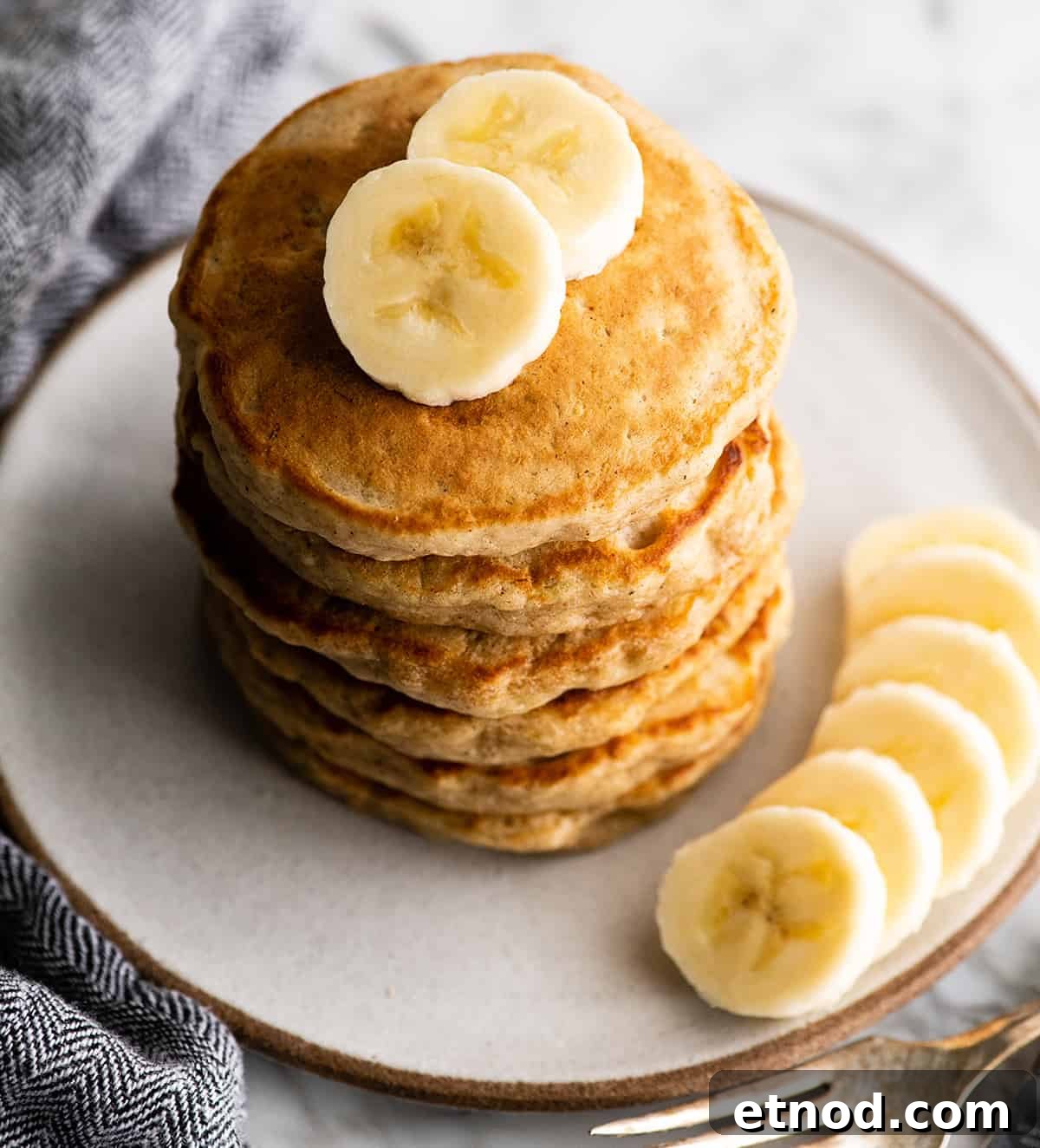 Pancakes with sliced bananas stack of 6 banana pancakes with sliced bananas
