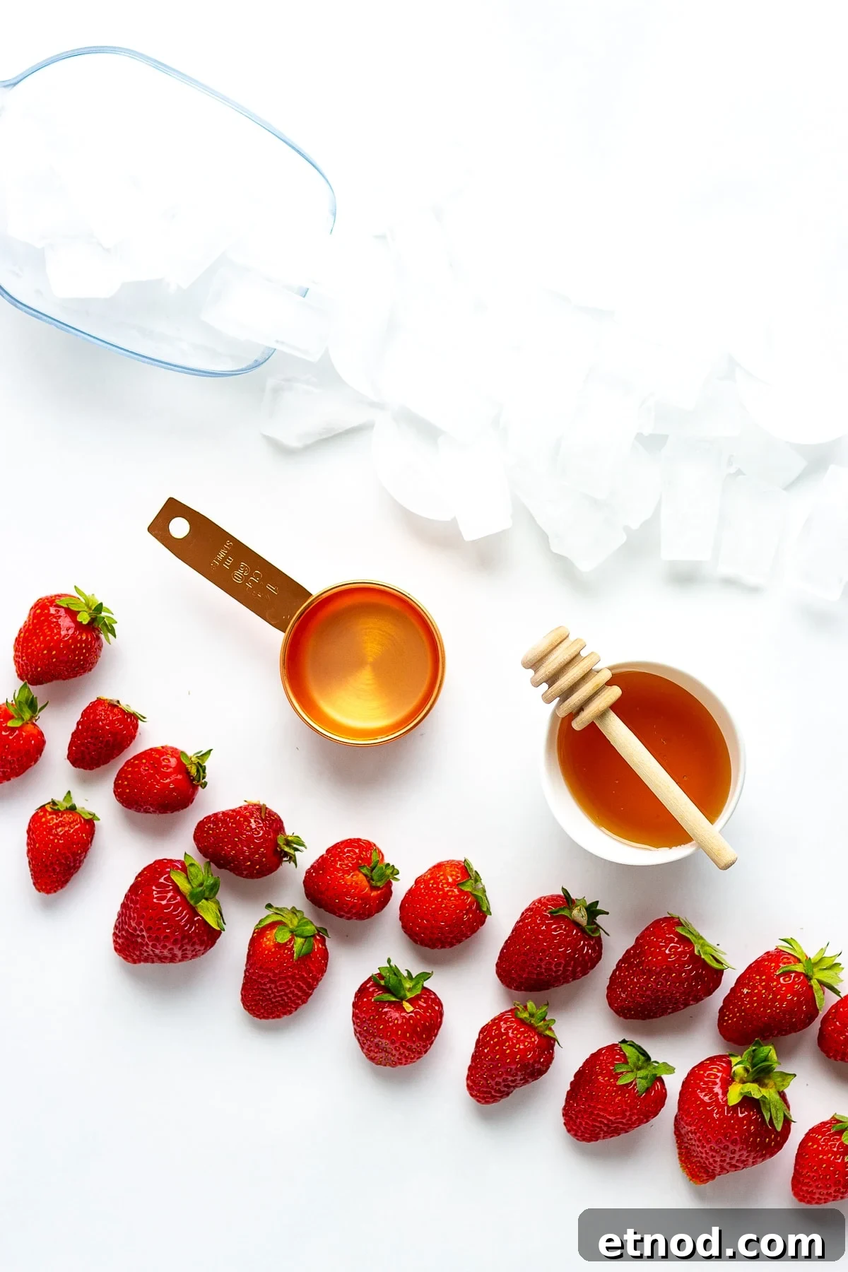 Refreshing Strawberry Slush Recipe for Summer Sips 4 Overhead photo of the ingredients needed to make a homemade strawberry slushie.