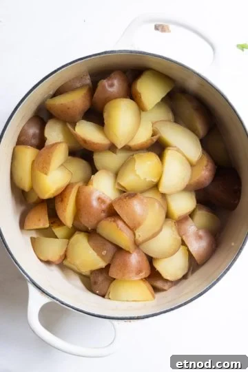 potatoes transferred back to hot pot after being boiled