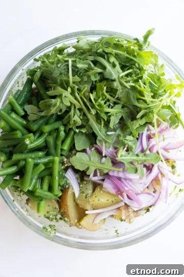 All ingredients added to potato salad