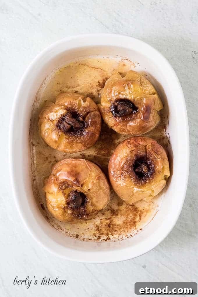 Warm Cinnamon Baked Apples with Caramel Drizzle 6 The fruit has baked and is ready to be served.