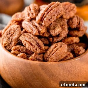 Slow-Cooker Maple Bourbon Candied Pecans: Sweet & Crunchy Snack 2 square image of candied pecans in a wooden bowl